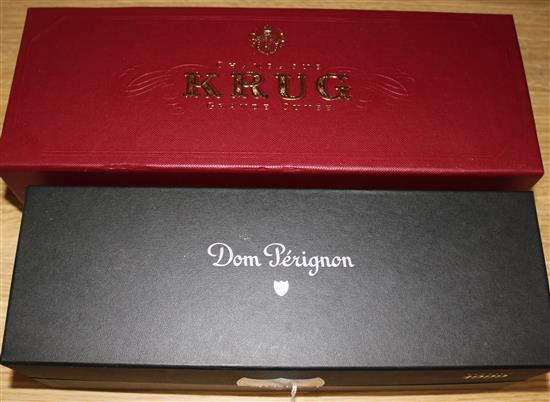 One bottle of Dom Perignon Vintage Champagne 1999 and one bottle of Krug Grand Cuvee Champagne,